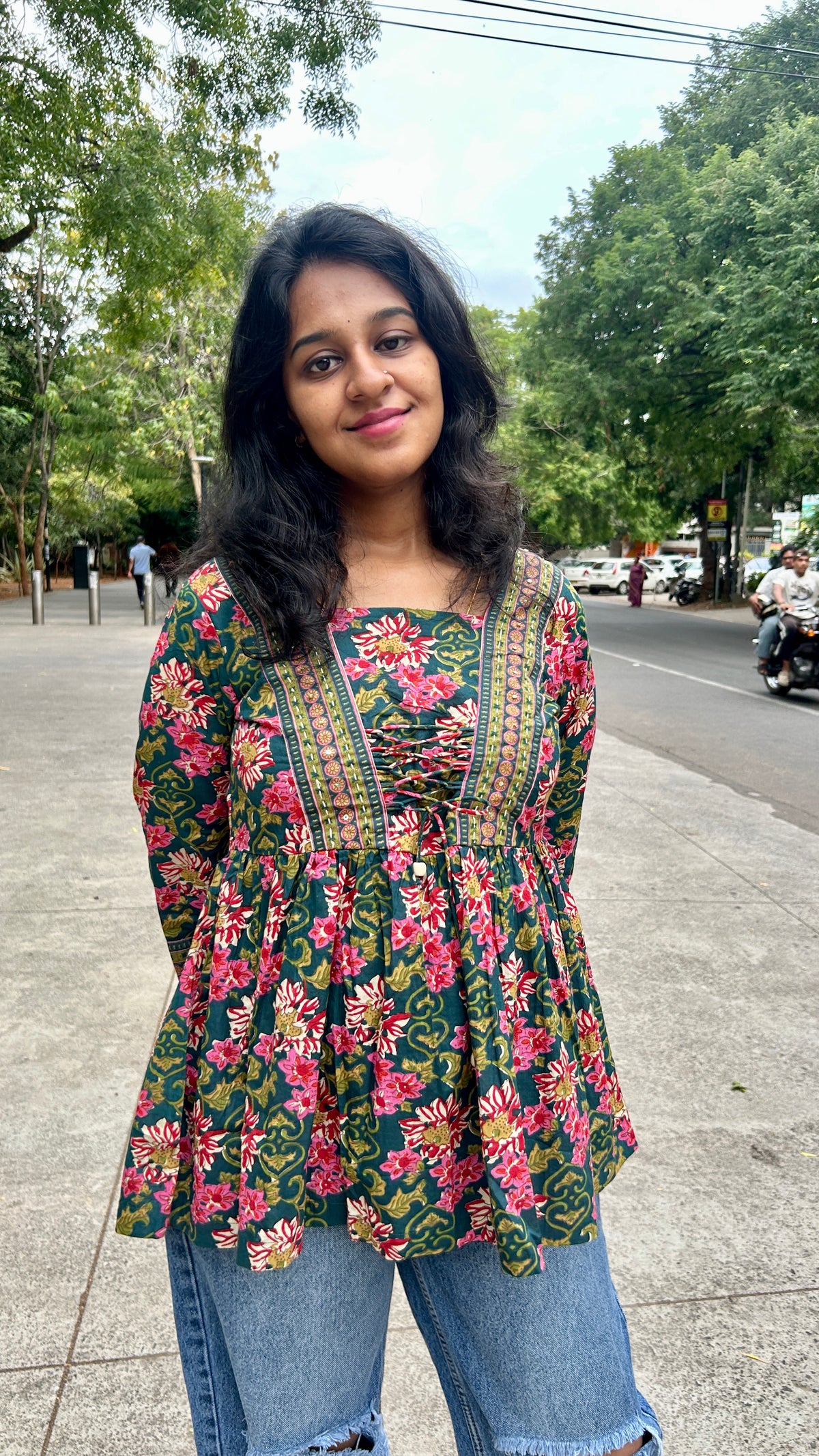 GREEN FRONT KNOT PEPLUM TOP
