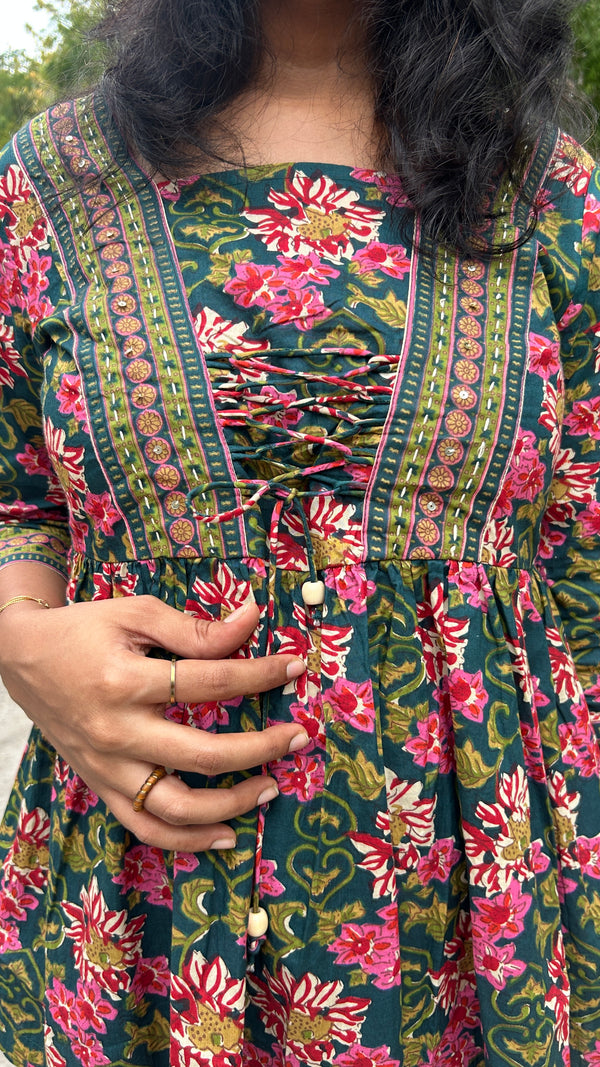 GREEN FRONT KNOT PEPLUM TOP