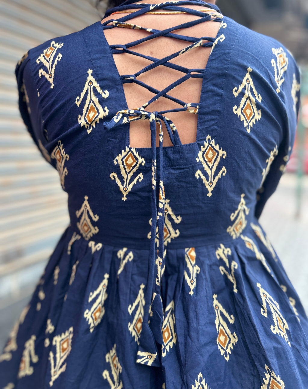 BLUE BACK TIE UP PEPLUM